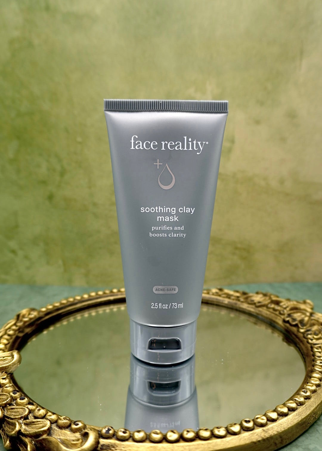 Face Reality Soothing Clay Mask styled product photo, creamy triple clay and charcoal mask for oily and acne-prone skin